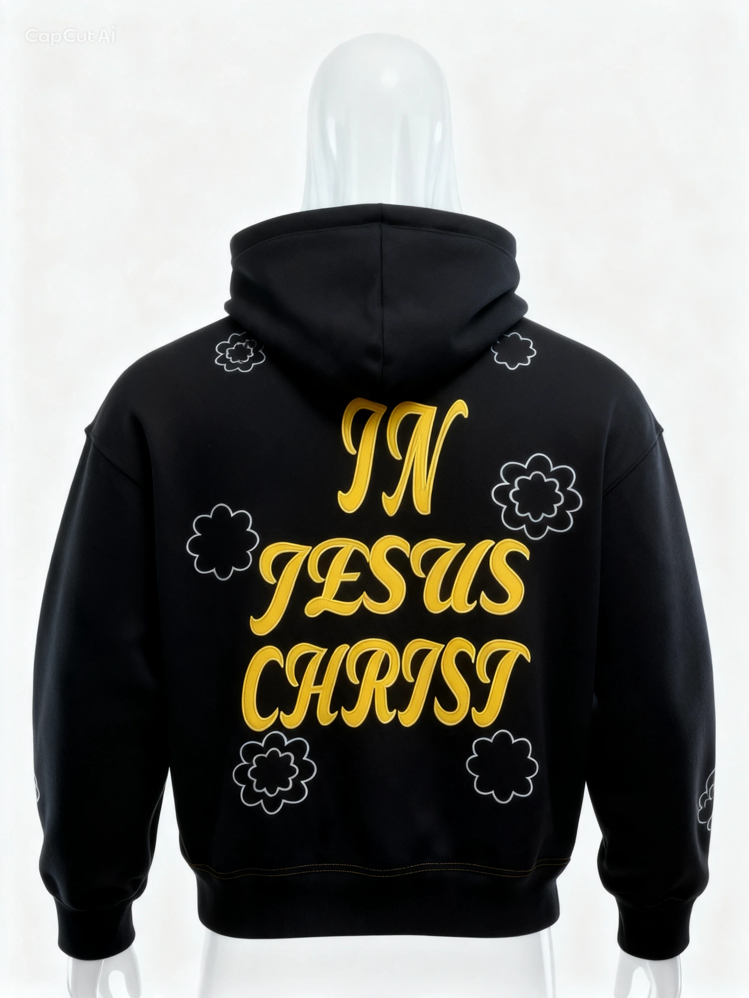 Back of the hoodie with raised gold In Jesus Christ script and flower embroidery